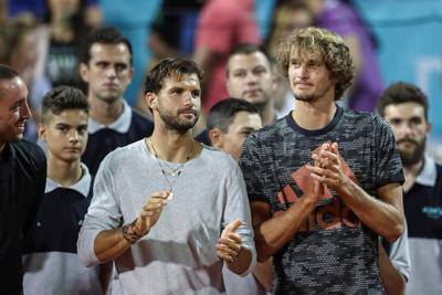 Bulgaria's Grigor Dimitov and Germany's Alexander Zverev are seen during the trophy ceremony during Adria Tour at Novak Tennis Centre in Belgrade, Serbia, June 14, 2020. Picture taken June 14, 2020. REUTERS/Marko Djurica