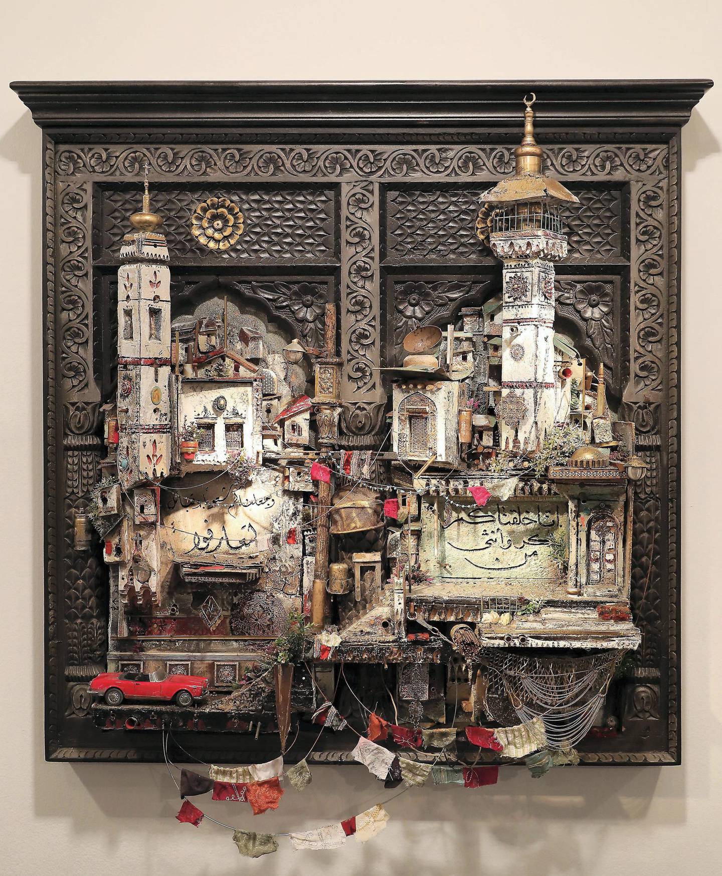 SHARJAH, UNITED ARAB EMIRATES, Dec 18 – 2019 :- Miniature art work titled “Journeys from An Absent Present to A Lost Past”  by Mohamad Hafez on display at the Sharjah Art Museum in Sharjah. He made miniature models of Syria’s ruined buildings from his childhood memories in his country of origin, Syria. (Pawan Singh / The National) For Arts & Culture/Online/Instagram. Story by Alexandra Chaves