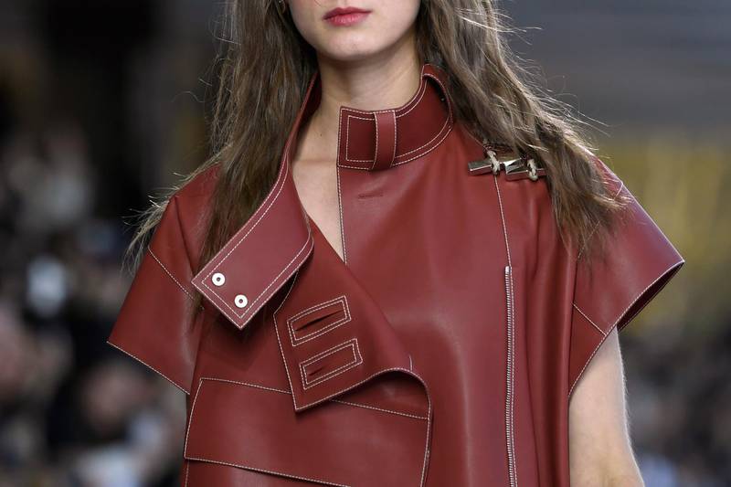 Leather is transformed at Hermes into a buttery soft top, to be worn open and loose.  AFP .Bertrand GUAY