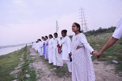 A human chain is formed on the eve of World Environment Day in New Delhi, as residents vow to keep the Yamuna river clean. Reuters