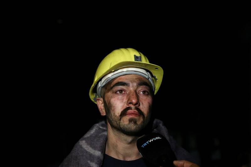 A mine worker who managed to escape the blast talks to media. Reuters / Cagla Gurdogan