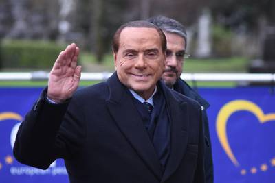 Former Prime Minister and president of Italian right-wing party Forza Italia Silvio Berlusconi (2nd-R) arrives to attend a meeting of the European People's Party (PPE) in Brussels on December 14, 2017, ahead of a summit of European Union (EU) leaders.
European leaders will discuss the migration crisis and defence on December 14, followed by Brexit the day after. / AFP PHOTO / JOHN THYS