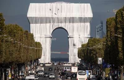 The fully wrapped Arc de Triomphe monument is seen from the Champs-Elysees. EPA
