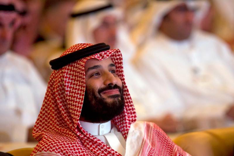 FILE - In this Tuesday, Oct. 23, 2018 file photo, Saudi Crown Prince Mohammed bin Salman smiles as he attends the Future Investment Initiative conference, in Riyadh, Saudi Arabia. Whether pressured to speak up after receiving assistance or making a diplomatic play for more, some African countries are expressing support for Saudi Arabia as shocking details in the killing of Jamal Khashoggi approached a crescendo, with South Sudan issuing a rare statement praising the Saudi position to defuse the crisis as "honorable". (AP Photo/Amr Nabil, File)