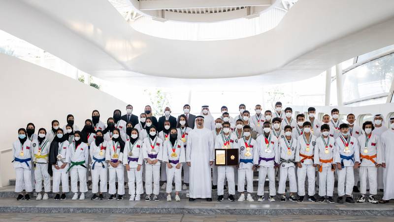 Sheikh Khaled bin Mohamed bin Zayed with the UAE jiu-jitsu team and members of the Jiu-Jitsu World Championship organising committee. All photos: Abu Dhabi Government Media office