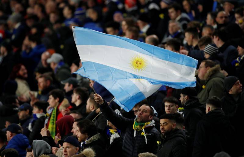 An Argentina flag waves in the Cardiff crowd to pay homage to Sala. Action Images via Reuters
