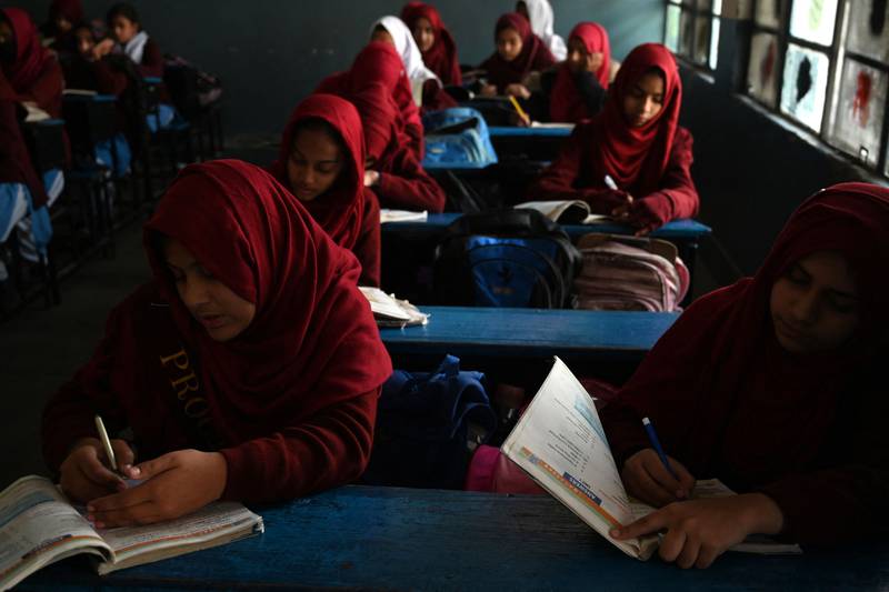 School pupils in Rawalpindi during a huge power cut that affected most of Pakistan’s 220 million population. AFP

