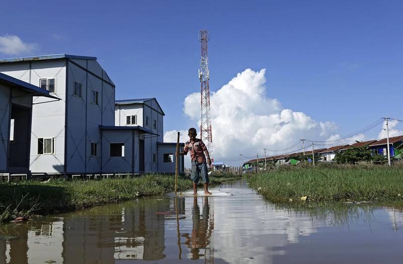 epa07665520 Rakhine childern play near a telecommunications tower at Sat Yoe Kya Ward, Sittwe, Rakhine state, Myanmar, 22  June 2019.  According to reports, a temporary band of internet data services   was announced for some conflict areas in Rakhine state. Fighting continues between Myanmar military troops and the Arakan Army in Rakhine State. About 40,000  residents have fled the village's into temporary camps in Ponnagyun, Buthidaung, Rathetaung, Mrauk U, Min Bya, Sittwe and Kyauktaw townships.  EPA/NYUNT WIN