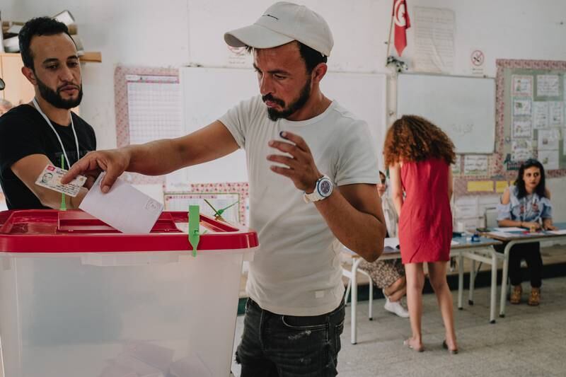Malek, 33, said he was voting yes to get rid of political parties such as the Islamist Ennahda party and the Free Destourian Party, which he regards as part of the old regime. Erin Clare Brown / The National
