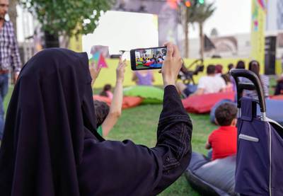 Abu Dhabi, United Arab Emirates, October 17, 2019.  Reem Festival.-- First day visitors of the Reem Festival enjoy a magic show at the Al Reem Central Park.Victor Besa/The NationalSection:  NAReporter:  Panna Munyal