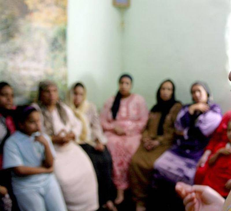 In Minia, Egypt, a counsellor tries to persuade a group of women to not have their daughters mutilated. Tara Todras-Whitehill / Reuters