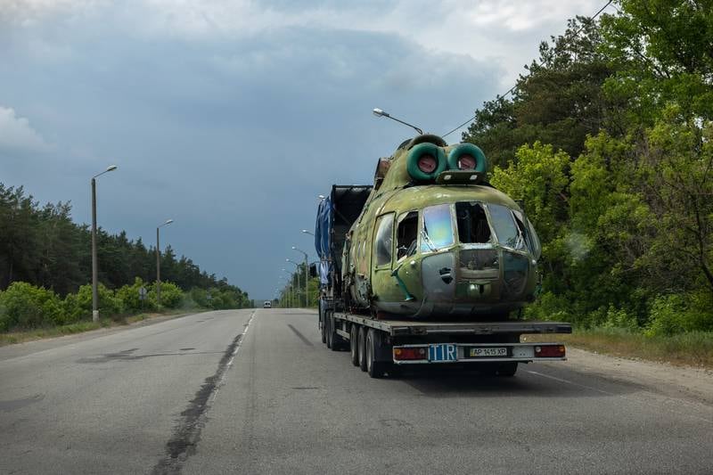 The wreckage of a Ukrainian military helicopter is transported in Kharkiv. Getty