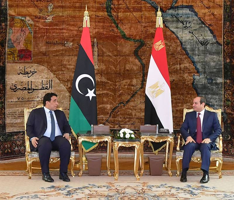 Egyptian President Abdel Fattah El Sisi (R) meets the Chairman of the Presidential Council of Libya, Mohamed Al Menfi at the presidential palace in Cairo. Photo: Egyptian Presidency