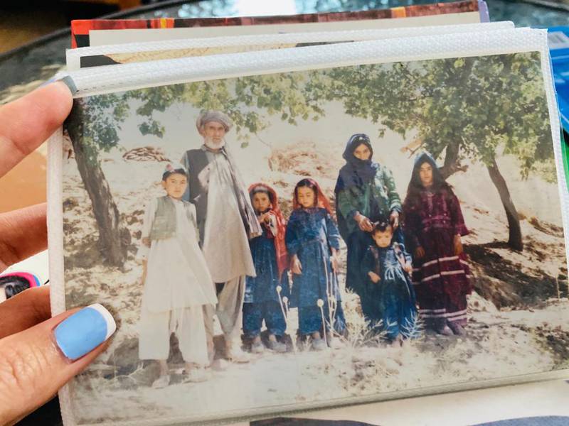 An album of photographs was all one refugee had to remember her life in Afghanistan. Photo: Gulafroze Ebtekar