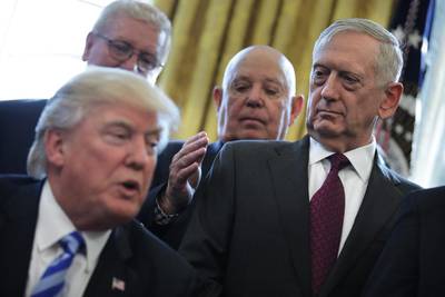 US defence secretary James Mattis watches president Donald Trump as he speaks during a meeting with Medal of Honor recipients in the Oval Office on March 24, 2017. Carlos Barria / Reuters