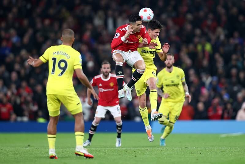 Cristiano Ronaldo battles for possession with Christian Norgaard of Brentford during United's 3-0 Premier League win at Old Trafford on May 2. Getty