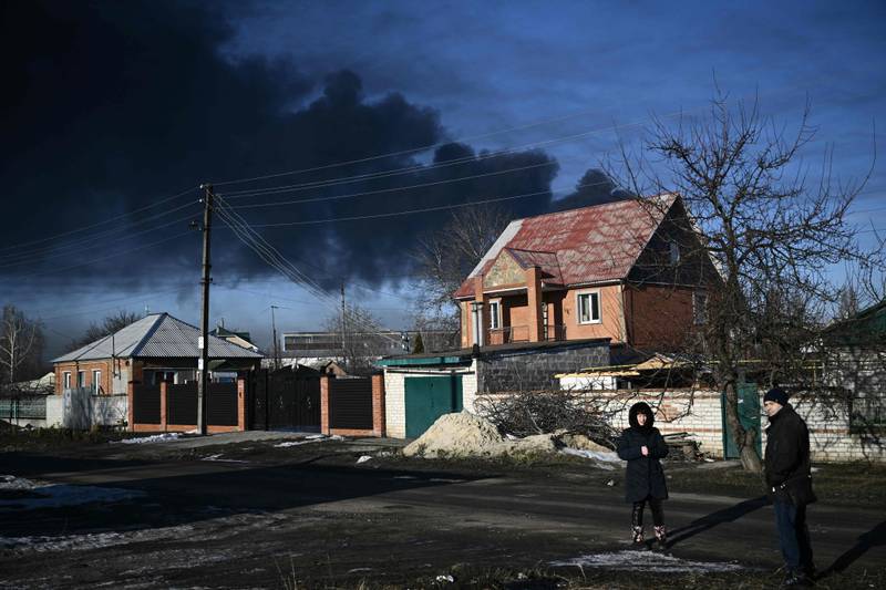 Black smoke rises from a military airport in Chuguyev near Kharkiv. AFP