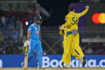 Australia's Mitchell Starc, right, celebrates the dismissal of India's Ishan Kishan in Chennai. AP