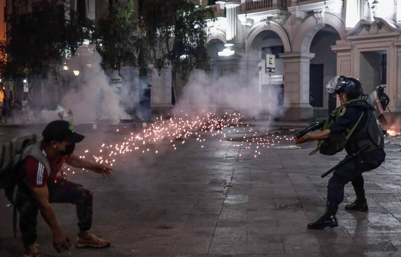 Protesters and police clash in Lima, Peru. Activists are calling for early elections and the resignation of President Dina Boluarte. EPA