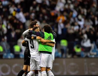 Real Madrid players celebrate after winning the semi-final in Riyadh. EPA