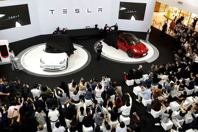 Tesla's Model Y and Model 3 vehicles at an official launch in Thailand in December. EPA