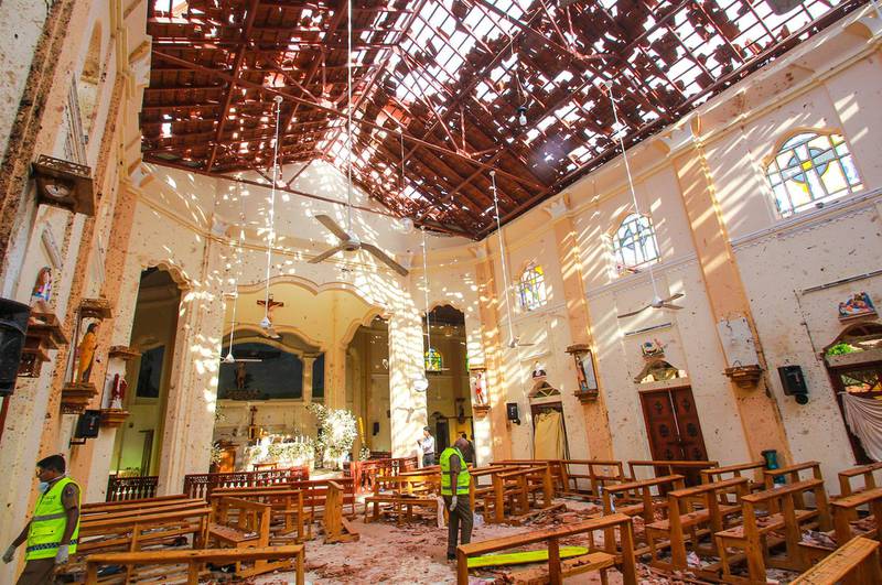 Sri Lankan officials inspect St Sebastian's Church in Negombo. Getty
