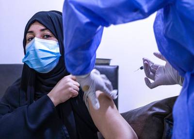 Abu Dhabi, United Arab Emirates, December 13, 2020.  Aysha Mohammed Ahmad Ali went to Abu Dhabi from Al Ain to get vaccinated at the Burjeel Hospital.Victor Besa/The NationalSection:  NA
