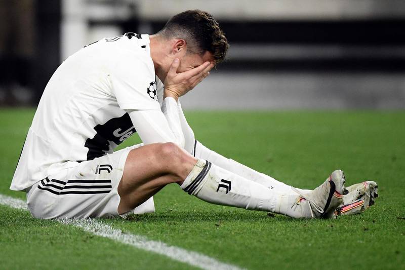 TOPSHOT - Juventus' Portuguese forward Cristiano Ronaldo reacts during the UEFA Champions League quarter-final second leg football match Juventus vs Ajax Amsterdam on April 16, 2019 at the Juventus stadium in Turin. / AFP / Filippo MONTEFORTE
