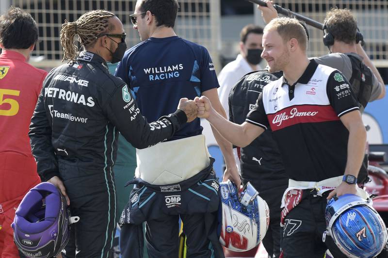 Lewis Hamilton greets Valtteri Bottas at the Bahrain International Circuit. AFP