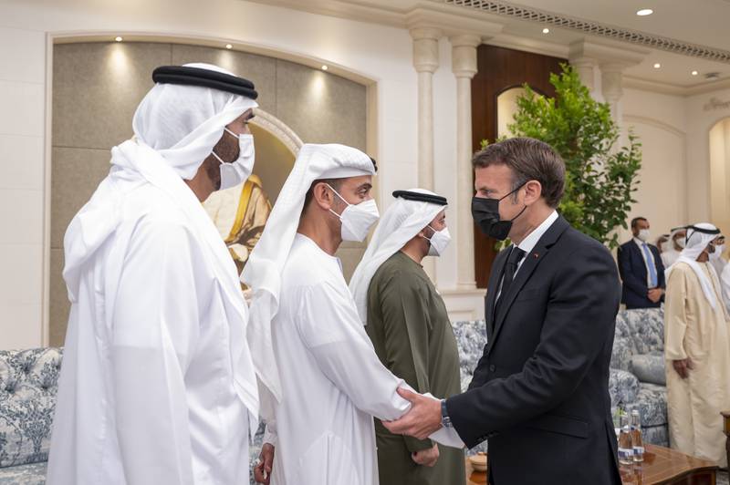 Emmanuel Macron with Sheikh Hazza bin Zayed, Vice Chairman of the Abu Dhabi Executive Council and Sheikh Saeed bin Zayed, Abu Dhabi Ruler's Representative.