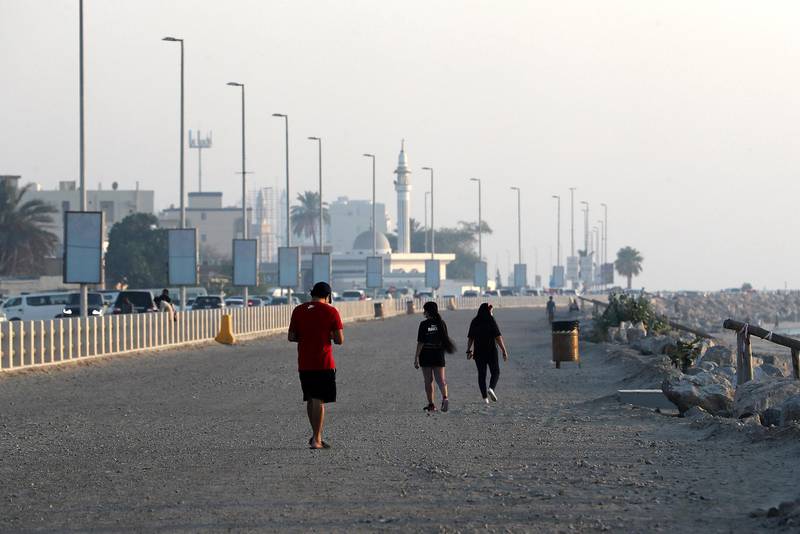 RAK, UNITED ARAB EMIRATES , May 28 – 2020 :- People wearing protective face mask as a preventive measure against the spread of coronavirus during the evening near the beach area in Ras Al Khaimah. UAE government lift the coronavirus restriction for the residents and businesses around the country. (Pawan Singh / The National) For News/Online/Stock/Instagram. 