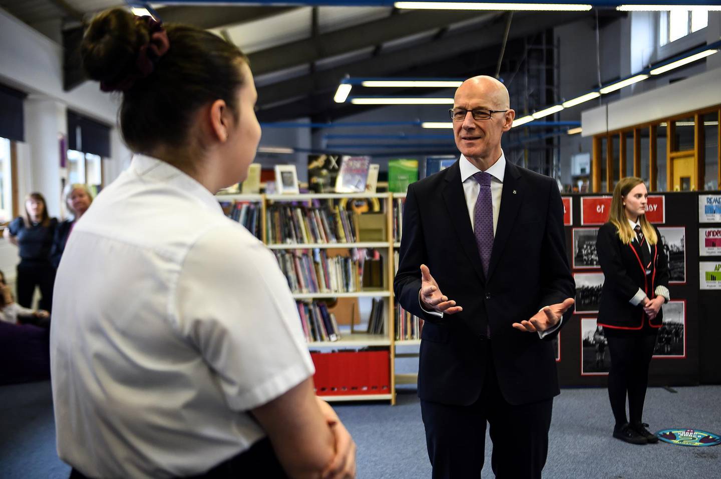 Deputy First Minister of Scotland and Cabinet Secretary for Education and Skills John Swinney visits Stonlelaw High School on the day pupils receive their exam results, in Rutherglen, Glasgow, Scotland, Britain, August 4, 2020. Exams were cancelled in Scotland due to the coronavirus pandemic and pupils have been awarded grades based on assessment. Andy Buchanan/Pool via REUTERS
