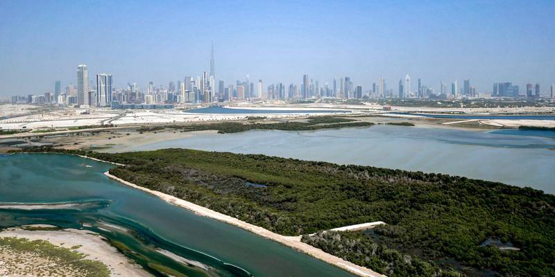 The Ras al Khor Wildlife Sanctuary and the Dubai Creek in the foreground.