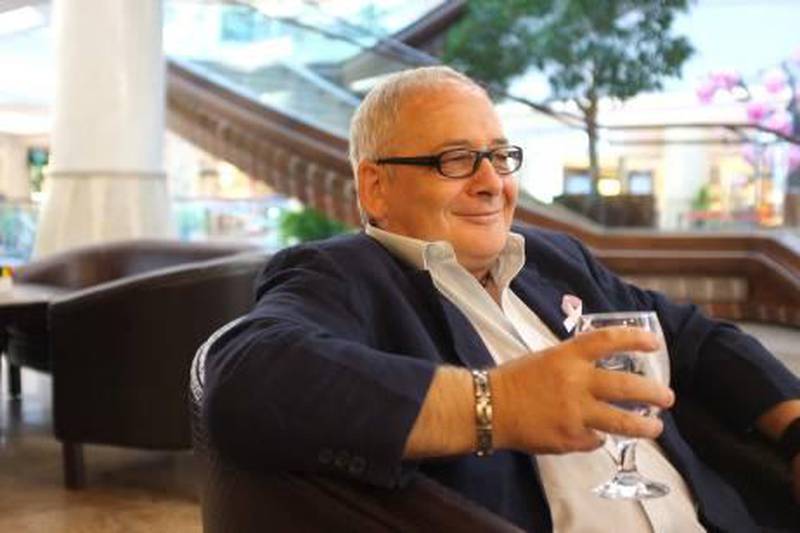 October 06. Ahmet Kianin, drinks a glass of overpriced water at a restaurant in Bur Dubai. October 06, Dubai, United Arab Emirates (Photo: Antonie Robertson/The National)