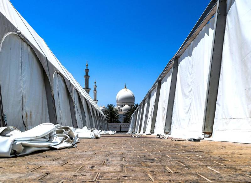 Abu Dhabi, U.A.E., June 18, 2018.  Sheikh Zayed Grand Mosque after Ramadan.  Workers disassemble the iftar tents at the North Parking Lot area of the Grand Mosque.Victor Besa / The NationalRequested by:   Olive Obina