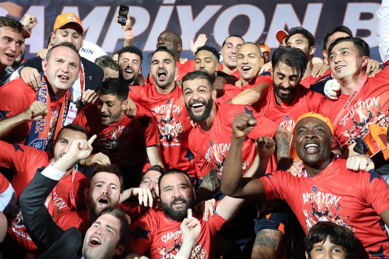 Basaksehir's players celebrate winning the Turkish Super League Championship. EPA