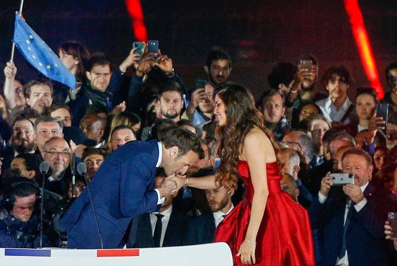 French President Emmanuel Macron kisses the hand of Egyptian opera singer Farrah El Dibany after her performance at his victory event on April 24, 2022. All photos: Farrah El Dibany