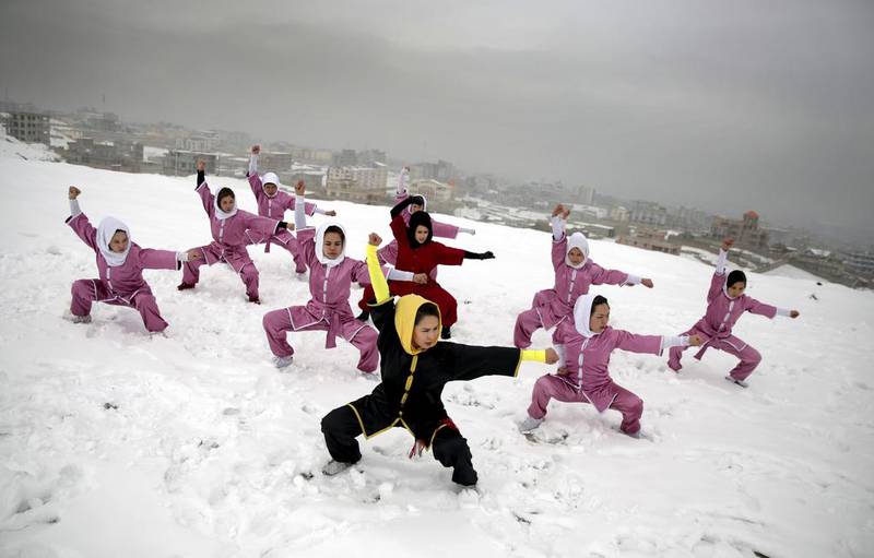 Ms Azimi, who is originally from Jaghuri in central Afghanistan, is training nine students in the martial arts to prepare for Olympic competitions. Massoud Hossaini / AP Photos