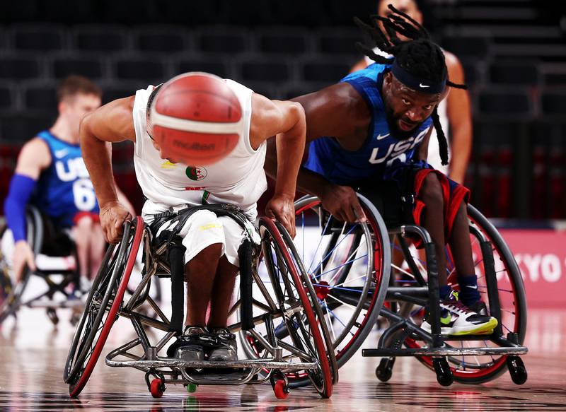 Algeria's Rafik Mansouri and Matt Scott of the United States during their Tokyo Paralympics wheelchair basketball match at the Ariake Arena on Monday August 30. Reuters