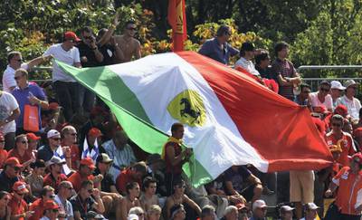 MONZA, ITALY - SEPTEMBER 13:  Ferrari tifosi attend the Italian Formula One Grand Prix at the Autodromo Nazionale di Monza on September 13, 2009 in Monza, Italy.  (Photo by Vladimir Rys/Bongarts/Getty Images)
