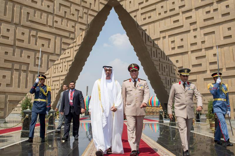 CAIRO, EGYPT - September 18, 2014: HH General Sheikh Mohamed bin Zayed Al Nahyan Crown Prince of Abu Dhabi and Deputy Supreme Commander of the UAE Armed Forces (center L), and Major General Tawhid Tawfiq Assistant to the Secretary of Defence and Commander of the Central Military Zone (center R), visit the Unknown Soldier Memorial and the tomb of the late Muhammad Anwar El Sadat former President of Egypt, in Nasr City, Cairo.
( Ryan Carter / Crown Prince Court - Abu Dhabi )
---