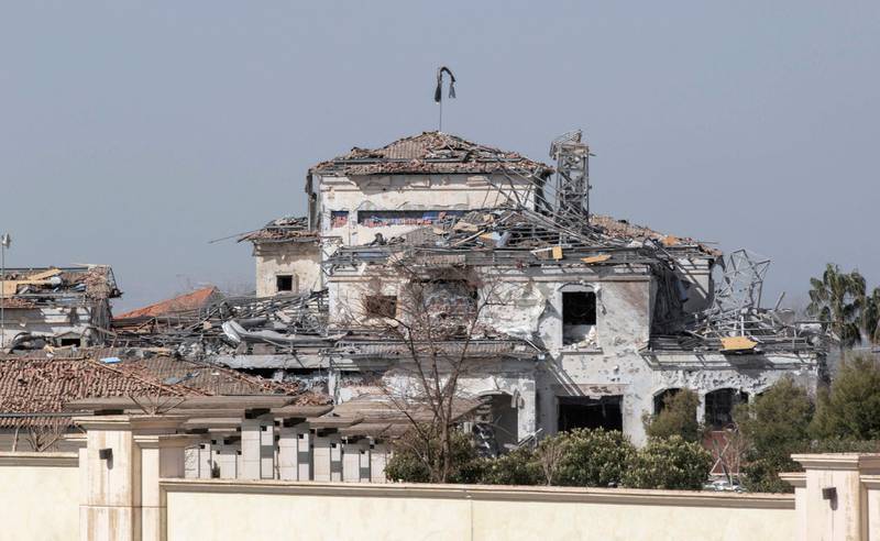 A damaged building after the overnight attack in Erbil. US officials, speaking to AFP, said the missiles came from Iran.