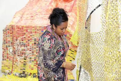 Mae-Ling Lokko, an artist and educator, is the curator of the El Anatsui exhibition called Shard Song. 
