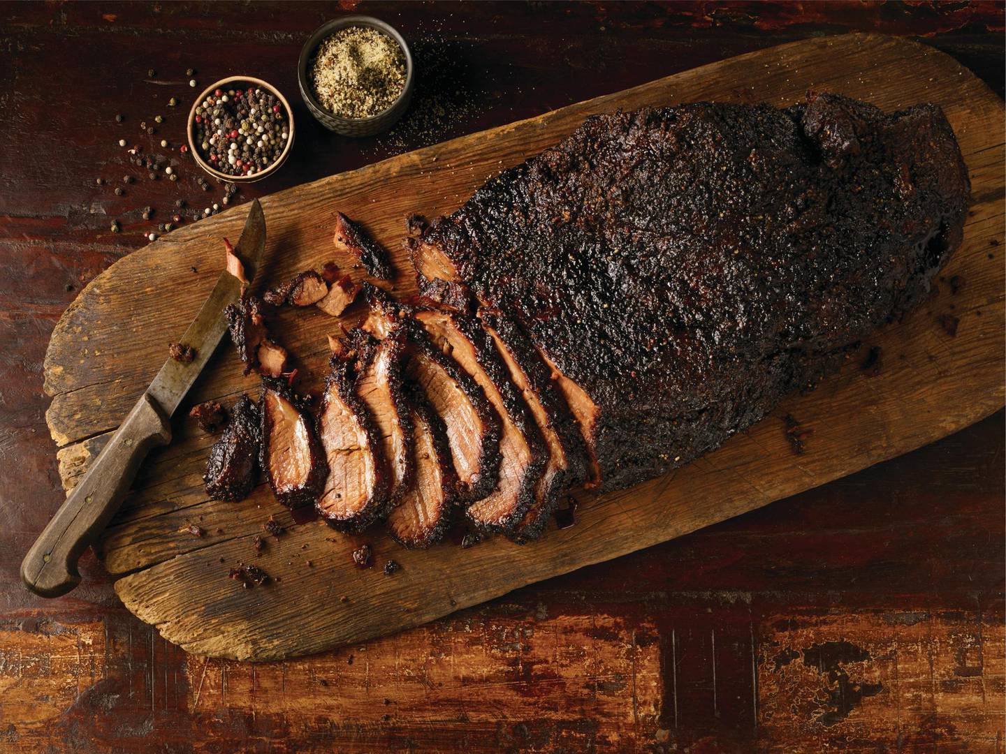 Beef brisket slow-smoked in a hickory wood pit