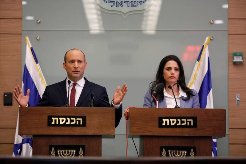 epa07176691 Israeli Minister of Education Naftali Bennett (L) and Justice Minister Ayelet Shaked speak during a press conference in the Israeli Knesset, (Israeli Parliament), in Jerusalem, 19 November 2018. Media reports state that the Netanyahu government will not go to early elections after Naftali Bennett and Ayelet Shaked of the Jewish Home Party decided not to resign from the coalition. The elections are scheduled to take place in November 2019  EPA/ABIR SULTAN
