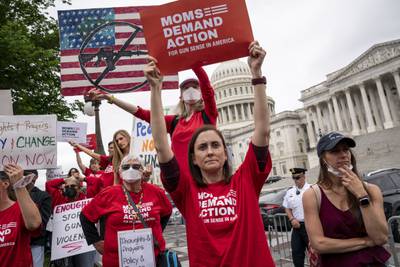 Activists join Senate Democrats outside the Capitol, in Washington, to demand action on gun control legislation after the killings at the Texas elementary school this week.  AP