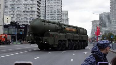 A Russian soldier stands guard in front of an RS-24 Yars, a Russian MIRV-equipped thermonuclear armed intercontinental ballistic missile, during a parade in Moscow. Getty