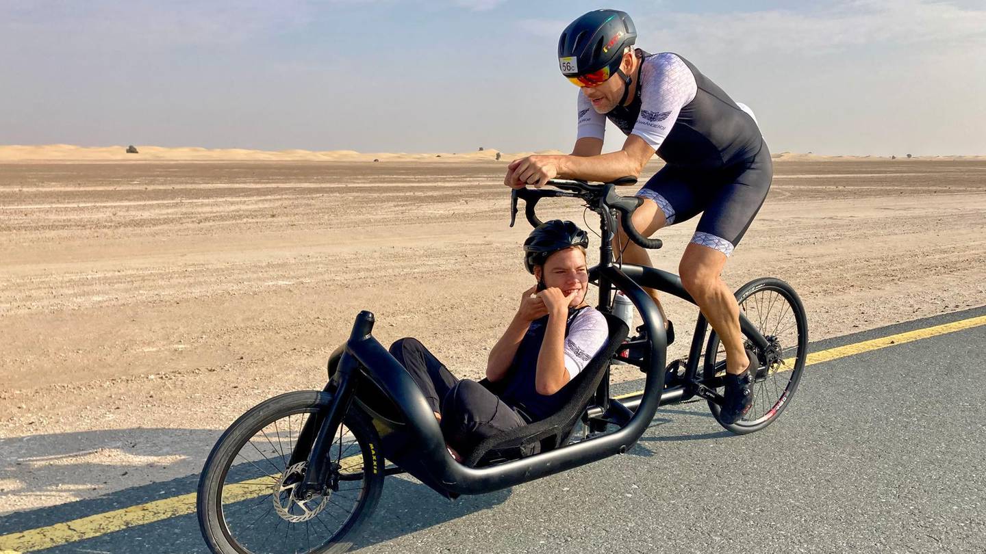 Father and son join forces for Dubai triathlon to show sport has no