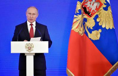 Russian President Vladimir Putin delivers a speech during a reception celebrating during National Unity Day in Moscow, Russia, Sunday, Nov. 4, 2018. (Alexander Nemenov/Pool Photo via AP)