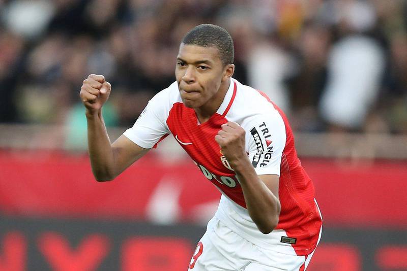Monaco's French forward Kylian Mbappe celebrates after scoring a goal against Bordeaux on March 11, 2017 at the Louis II Stadium in Monaco. Valery Hache / AFP
